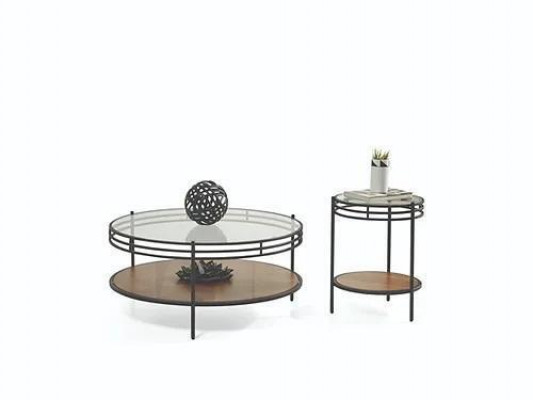 Une table basse moderne de designer avec une table ronde en verre, une table basse en 2 pièces.